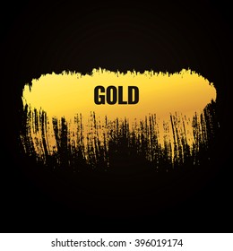 Golden brushstroke of the precious metal on a dark background
