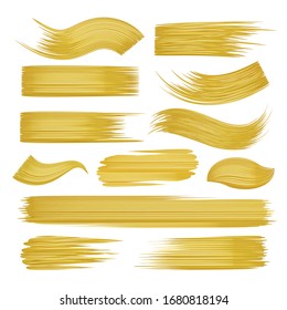 Golden brushstrokes. Gold paint strokes vector design decoration graphics, abstract hand painted goldink stroke set on white