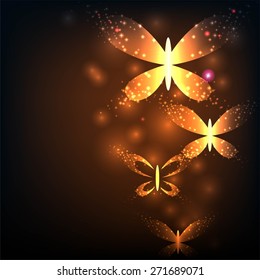 golden butterfly on black background