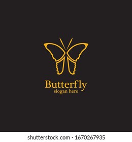 Golden butterfly on black background.logo template for beauty salon,spa salon,etc.
