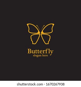Golden butterfly on black background.logo template for beauty salon,spa salon,etc.