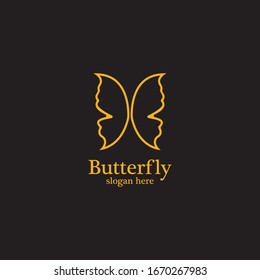 Golden butterfly on black background.logo template for beauty salon,spa salon,etc.