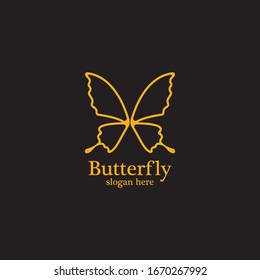 Golden butterfly on black background.logo template for beauty salon,spa salon,etc.