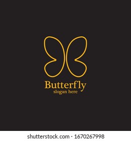 Golden butterfly on black background.logo template for beauty salon,spa salon,etc.