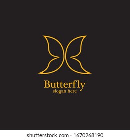 Golden butterfly on black background.logo template for beauty salon,spa salon,etc.