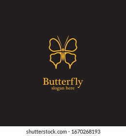 Golden butterfly on black background.logo template for beauty salon,spa salon,etc.