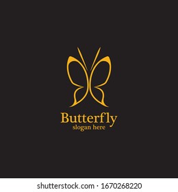 Golden butterfly on black background.logo template for beauty salon,spa salon,etc.