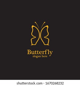 Mariposa dorada sobre fondo negro.logo para salón de belleza, salón de spa, etc.