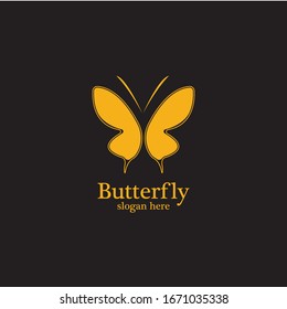 Golden butterfly on black background.logo template for beauty salon,spa salon,etc.