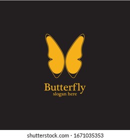 Golden butterfly on black background.logo template for beauty salon,spa salon,etc.