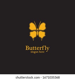 Golden butterfly on black background.logo template for beauty salon,spa salon,etc.