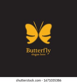 Golden butterfly on black background.logo template for beauty salon,spa salon,etc.