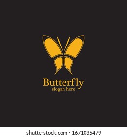 Golden butterfly on black background.logo template for beauty salon,spa salon,etc.