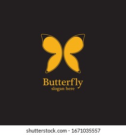 Golden butterfly on black background.logo template for beauty salon,spa salon,etc.