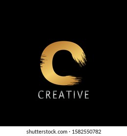 Golden  C  Brush Stroke  Logo design. Golden Paint Logo Letter Icon with Elegant  brush shape Vector Design concept.