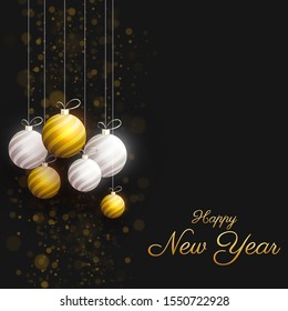 Golden calligraphy of Happy New Year with hanging baubles decorated on bokeh blurred black background. Can be used as greeting card design.