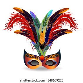 The golden carnival mask with multicolor feathers. The mask decorated with golden pattern.