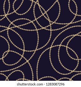 Golden chains on dark blue background. Abstract seamless jewelry vector pattern