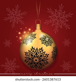 A golden Christmas bauble adorned with an intricate snowflake pattern on a red festive backdrop.