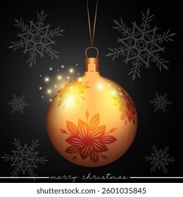 A golden Christmas sphere with a flower pattern set against a black festive background.