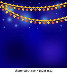 Golden Christmas Star on a blue background - decorating for the holidays