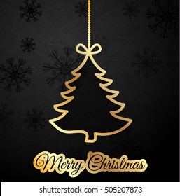 Golden christmas tree paper cut from black background with snowflakes for a papercraft postcard.