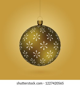 Golden Christmass ball with snowflakes print hanging on a golden chain