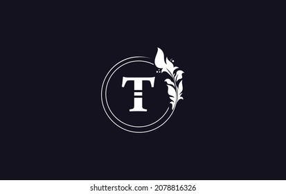 Golden circle leaf and creative art, symbol, logo design with T letters for professional brand and business