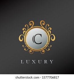 Golden Circle Luxury Letter C logo. Elegant circle luxury logo with golden color design concept for initial, emblem, luxuries business, wedding service and more brand identity.