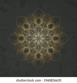 Golden circular mandala pattern on black background