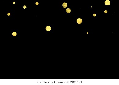 Golden confetti isolated on black background. Scatter gradient with gold confetti on dark backdrop. Glamour falling glitter. New year wallpaper. Luxury vector brochure template. Cover texture design.