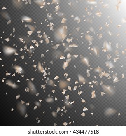 Golden confetti isolated on dark transparent background. EPS 10 vector file included
