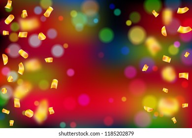 Golden confetti on bright colorful bokeh background with space for text.