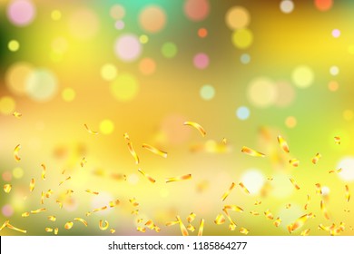 Golden confetti on bright colorful bokeh background with space for text.