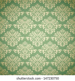 Golden damask wallpaper on green background