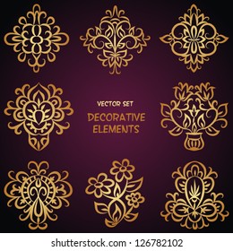 Golden decorative floral elements. Can be used for backgrounds, packaging, invitations,vintage cards, wrapping paper. Vintage design elements