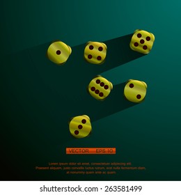 Golden Dices with red splashes, on a green table
