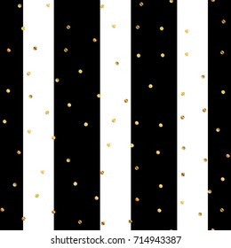 Golden dots seamless pattern on black and white striped sightly background.