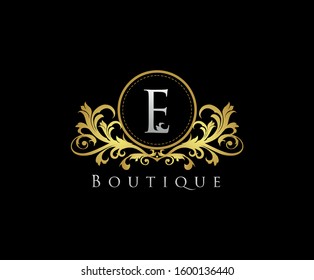 Golden E Boutique Logo Icon, Luxury E Letter Logo Design.