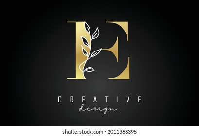 Golden E letter logo design with white leaves branch vector illustration. Creative and elegant icon with letter E.