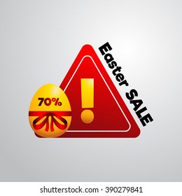 Golden easter egg a discount label, easter sale, attention triangle with exclamation point