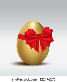 Golden Easter egg  with red ribbon bow. vector illustration