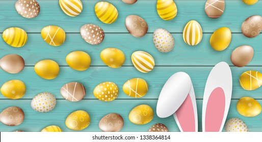 Golden easter eggs and hare ears on the wooden background.  Eps 10 vector file.