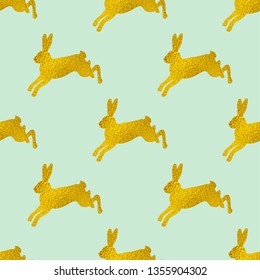 Golden Easter seamless pattern with rabbits on a green background. Vector illustration.