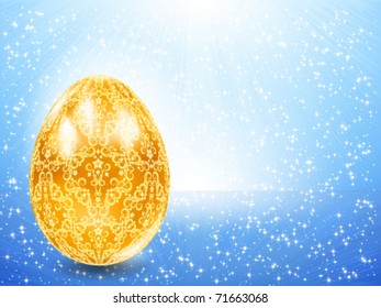 Golden egg on a background of blue rays.