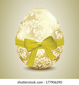 Golden egg width pattern and a golden bow.