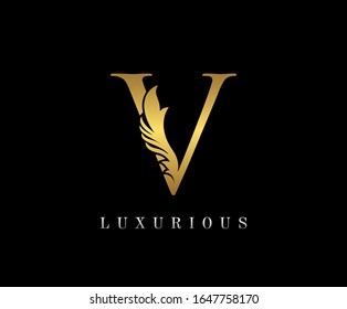 Golden Elegant letter V. Graceful royal style. Calligraphic beautiful logo. Vintage drawn emblem for book design, weeding card, brand name, business card, Restaurant, Boutique, Hotel. 