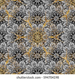 Golden element on background. Gold floral ornament in baroque style. Damask repeating background. Gold Wallpaper on texture background.