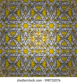 Golden element on yellow background. Gold Wallpaper on texture background.Damask pattern repeating background. Gold yellow floral ornament in baroque style.