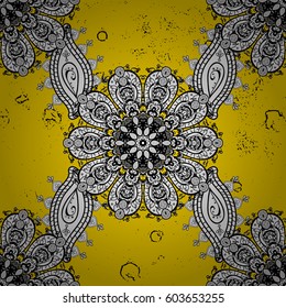 Golden element on yellow background. Ornate vector decoration. Vintage baroque floral pattern in gold over yellow. Luxury, royal and Victorian concept.